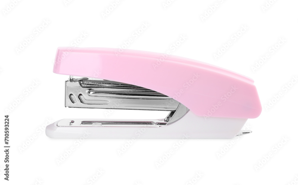 One new pink stapler isolated on white