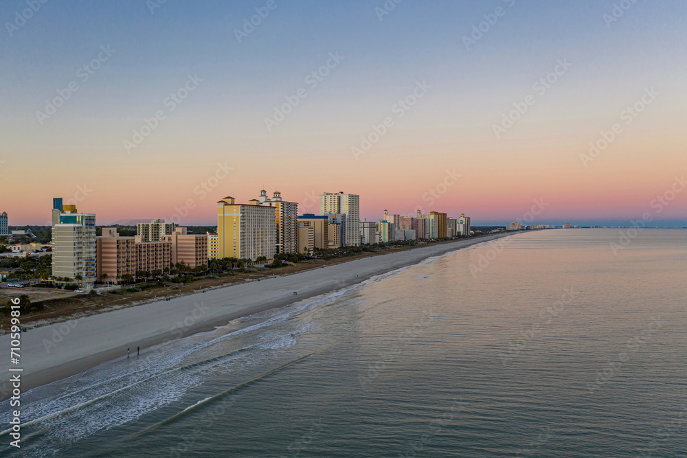 Aerial view of Myrtle Beach, with high buildings on the shoreline
