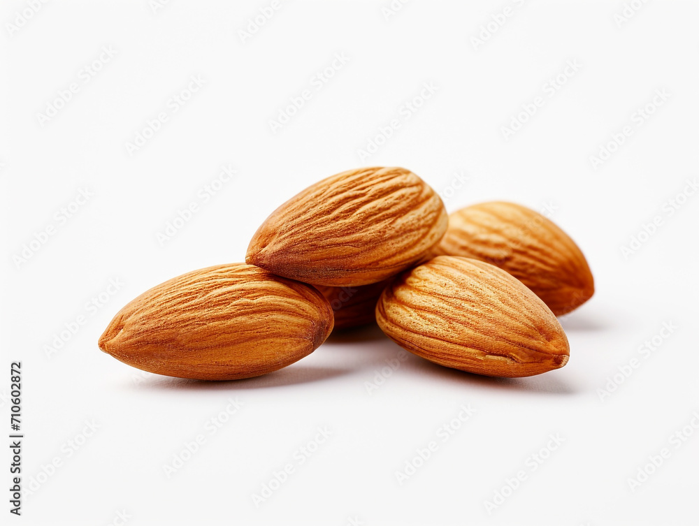 Almonds isolated on white background. Minimalist style. Almonds isolated on white background. Minimalist style.