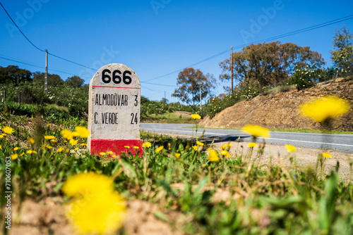 Road milestone indicating 666th kilometer on famous national road N2 going across Portugal