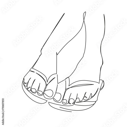 female legs in sandals
