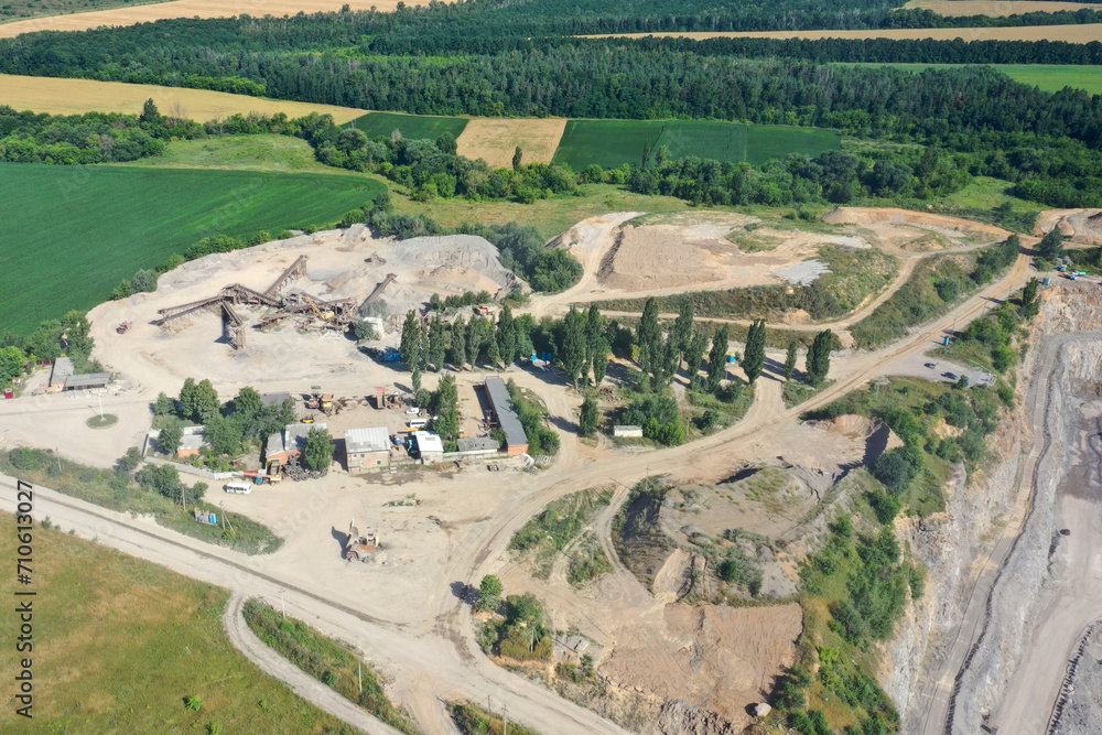 Naklejka premium Extraction of granite. Open cast mine. Stone Quarrying. Granite quarry.