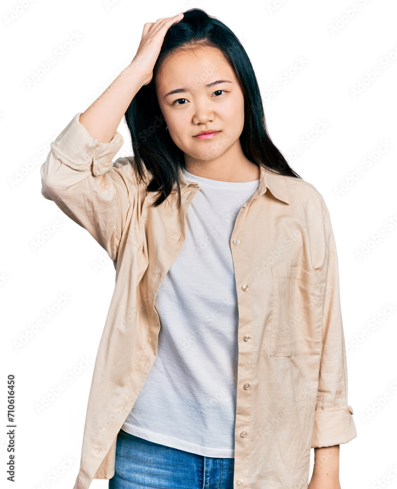 Young chinese woman wearing casual white t shirt and jacket confuse and wonder about question. uncertain with doubt, thinking with hand on head. pensive concept. Young chinese woman wearing casual white t shirt and jacket confuse and wonder about question. uncertain with doubt, thinking with hand on head. pensive concept.