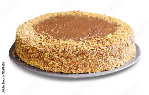 Fotografie Waffle cake with condensed milk cream and walnuts on White Background
