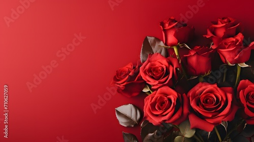 Bouquet of beautiful rose flowers on red background. Valentine s Day celebration