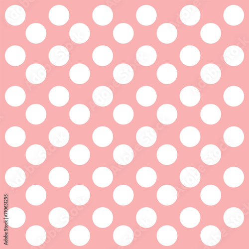 pink background with white polka dots