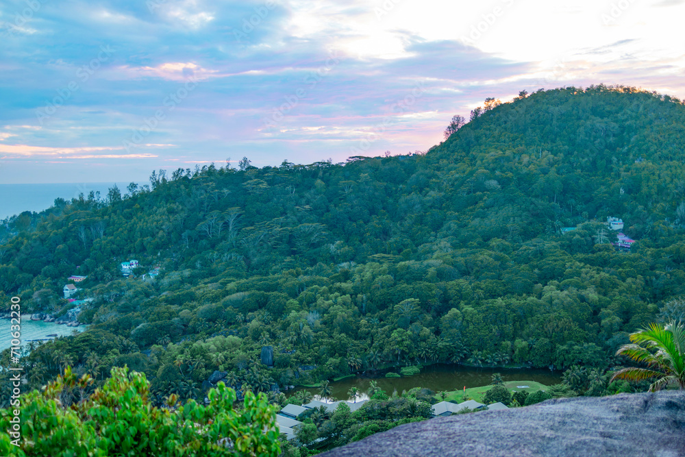 hiking mountain view on the ocean in a picturesque landscape in the Seychelles