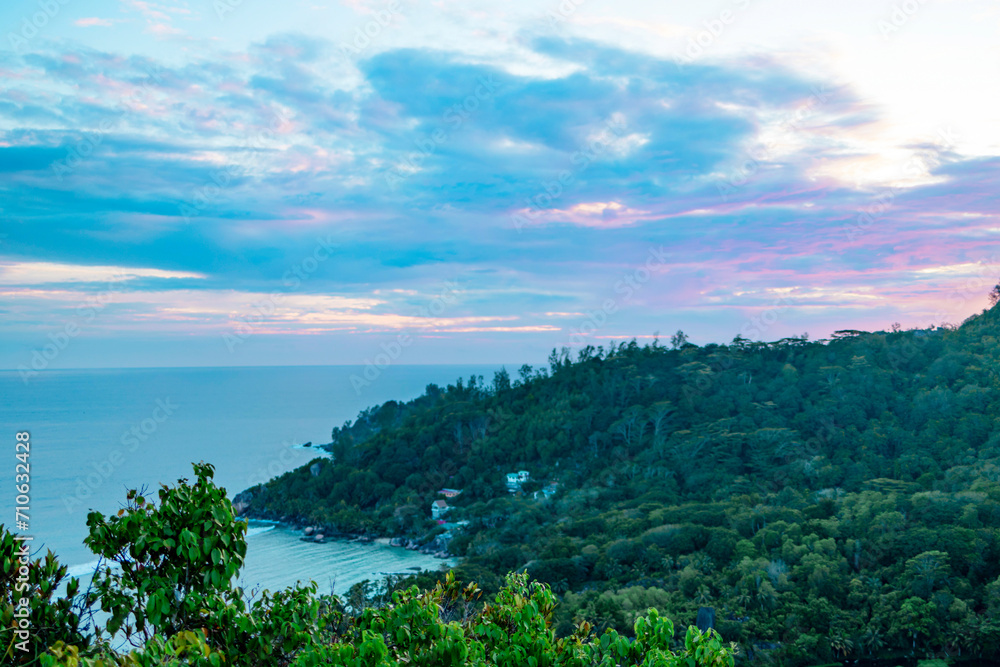 hiking mountain view on the ocean in a picturesque landscape in the Seychelles hiking mountain view on the ocean in a picturesque landscape in the Seychelles