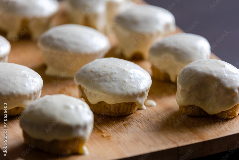 Homemade Bliss: Almond Muffins with Orange Glaze Close-Up Homemade Bliss: Almond Muffins with Orange Glaze Close-Up