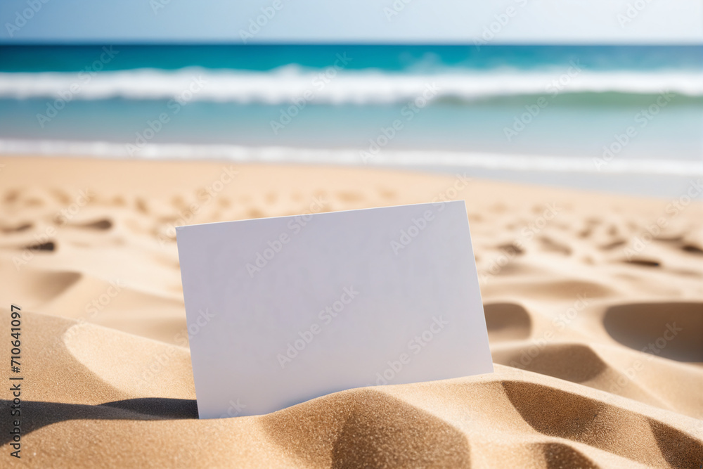 Sandy beach with empty white paper card for message design, blur sea and palm trees on background, Tranquil beach scene for travel inspirational - Mocup Sandy beach with empty white paper card for message design, blur sea and palm trees on background, Tranquil beach scene for travel inspirational - Mocup