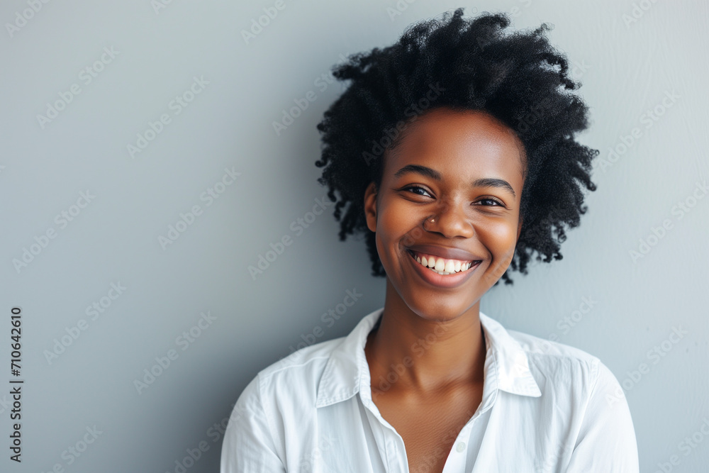 Portrait of smiling female doctor in white coat looking at camera. Happy female doctor in hospital. Portrait of woman doctor wearing uniform stand isolated on grey studio background. Portrait of smiling female doctor in white coat looking at camera. Happy female doctor in hospital. Portrait of woman doctor wearing uniform stand isolated on grey studio background.