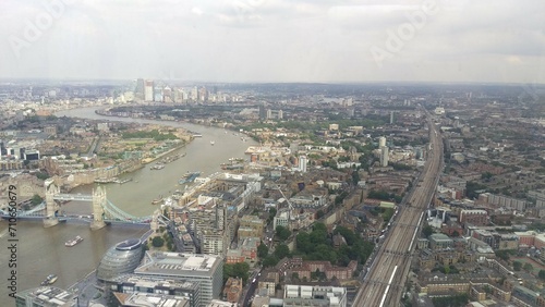 Aerial view of London's cityscape with river and buildings. © Danielli.capture