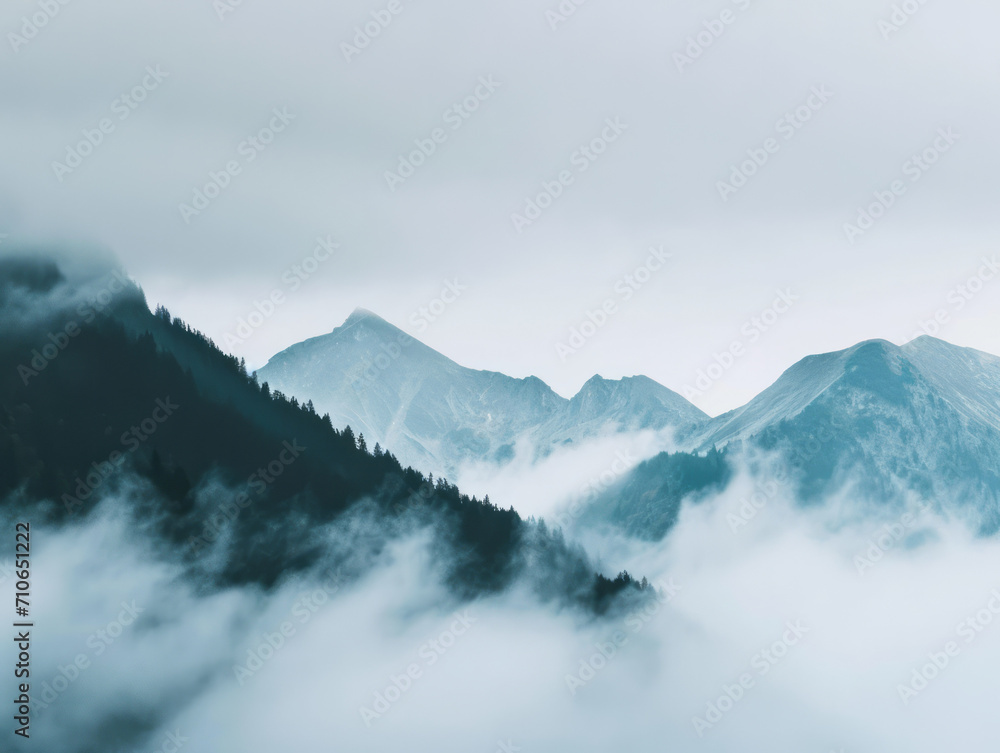 Beautiful mountain landscape with fog and clouds in the morning. Caucasus, Russia