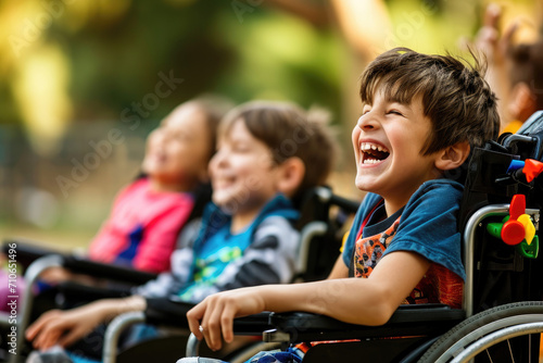 portrait of children in wheelchairs, laughing and talking happily