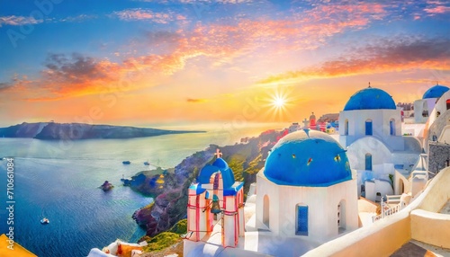 fantastic mediterranean santorini island greece amazing romantic sunrise in oia background morning light amazing sunset view with white houses blue domes panoramic travel landscape lovers island  photo