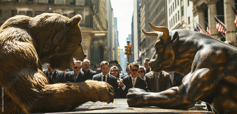 large bronze bear and bull are arm wrestling on a table in the middle of Wall Street surrounded by cheering businessmen in suits Stock Photo Adobe Stock