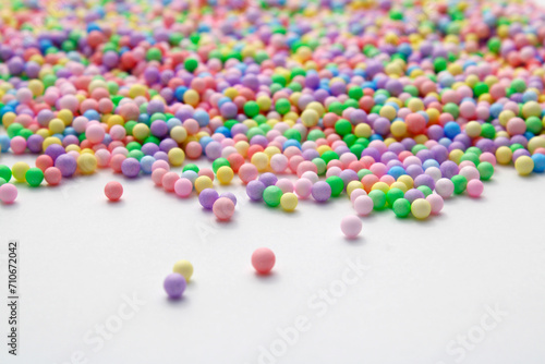 Background with balls of many colors in pastel tones