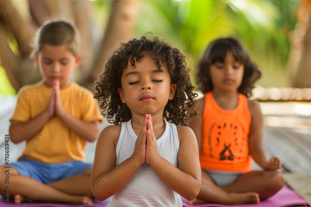 Children Learn Yoga on Mats. Children's yoga class. Charging At The Day Care Centre Children Learn Yoga on Mats. Children's yoga class. Charging At The Day Care Centre