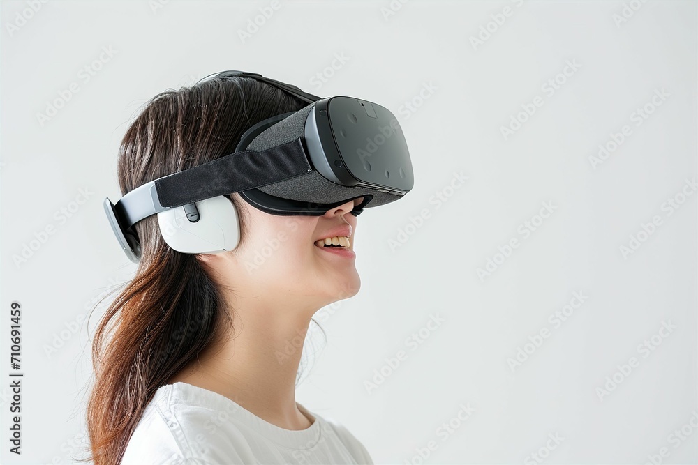 VRゴーグルをつけた日本人の女性のメタバースイメージ(メタバース・VR・バーチャルリアリティ・教育) VRゴーグルをつけた日本人の女性のメタバースイメージ(メタバース・VR・バーチャルリアリティ・教育)