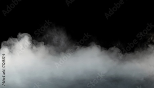 a cloud of white smoke on a black background thin smoke some areas of which seem thicker than others thick fog that expands over the surface