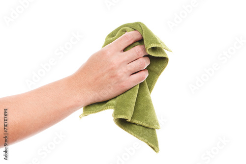 Hand holding green duster microfiber cloth used for cleaning isolated on white background photo