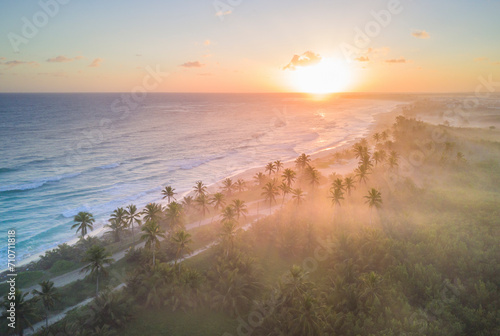 Aerial view of a long coastline with beach at sunset in Punta Cana, La Altagracia, Dominican Republic. photo
