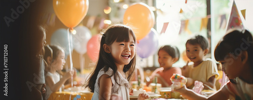 Happy kids on birthday celebration with color balloons. copy space for your text.