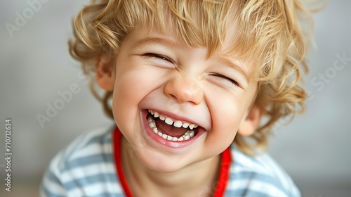 Smiling white american boy model with perfect teeth studio portrait for ads and web design