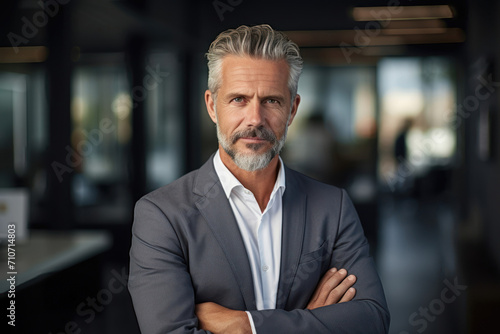 Mid Aged Businessman with Confident Stance in Office