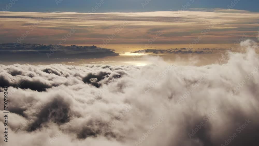 Aerial view of low clouds with clear sky above Tenerife Island, Canary Island, Spain. Aerial view of low clouds with clear sky above Tenerife Island, Canary Island, Spain.