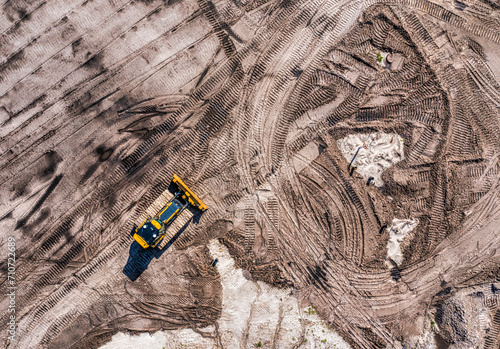 Aerial view of an excavator for heavy duty on a construction site in Wabasso, Florida, United States. photo