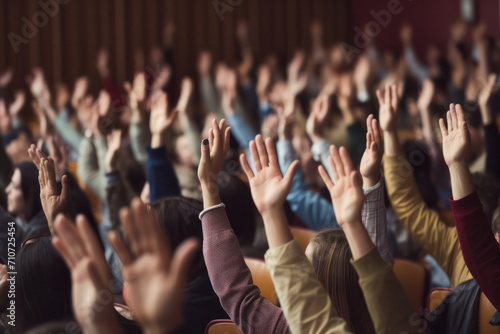 Cheers in class, Close up view of hands expressing enthusiasm in a lecture hall. photo