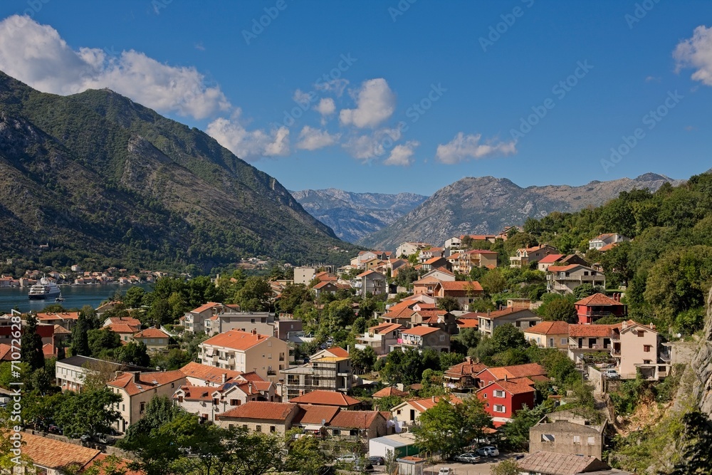 The historic town of Kotor, Montenegro, unfolds along the shores of the Adriatic, embraced by dramatic mountains and the tranquil bay.