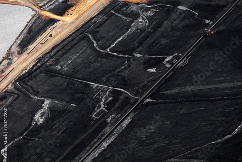 Aerial view of open-pit mine, showcasing extensive resource extraction and processing operations, Australia. photo