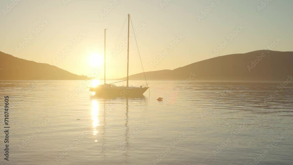 Sea view at sunset. Beautiful serene vmd on the evening sea in the bay Sea view at sunset. Beautiful serene vmd on the evening sea in the bay
