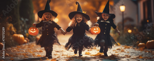 Children in scary halloween costumes with halloween pumpkins. Halloween concept. Halloween backgorund.
