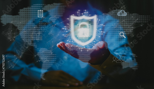 Cybersecurity and information technology security services concept. Businessman with protective gesture Lock icon to protect the security.AI