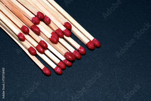 stacked matches lying on a table