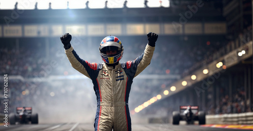 In white motorsport gear, the race car driver celebrates win triumph after winning the high-speed race. Concept of thrill of car racing photo