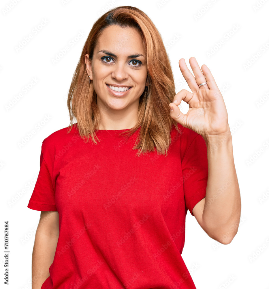 Φωτογραφία Hispanic young woman wearing casual red t shirt smiling positive doing ok sign with hand and fingers