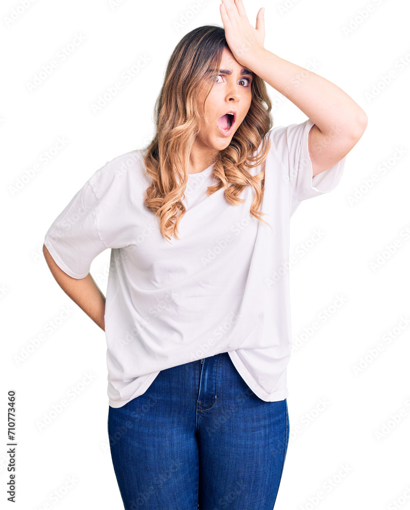 Young caucasian woman wearing casual clothes surprised with hand on head for mistake, remember error. forgot, bad memory concept. Young caucasian woman wearing casual clothes surprised with hand on head for mistake, remember error. forgot, bad memory concept.