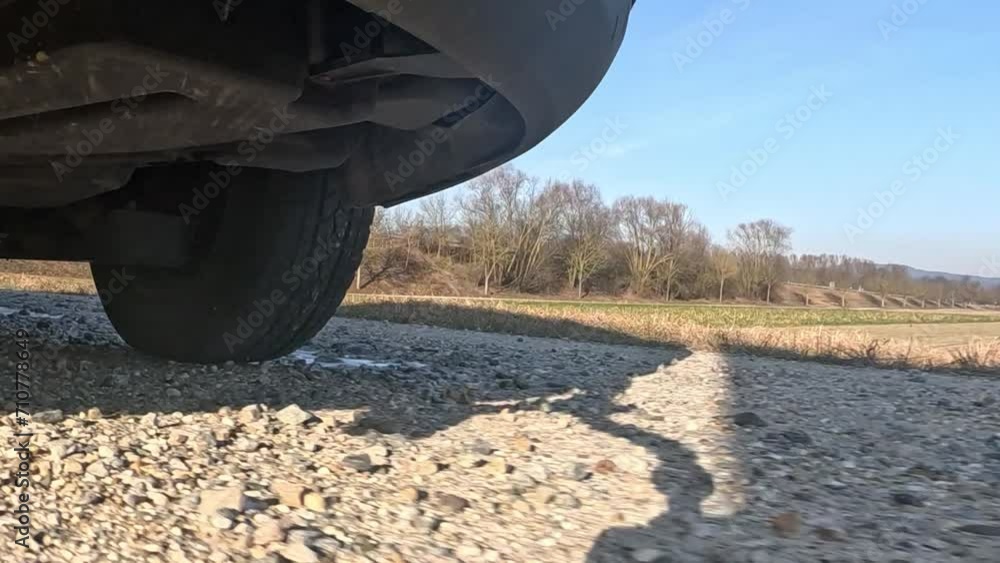 Exhaust while driving on a country road Exhaust while driving on a country road