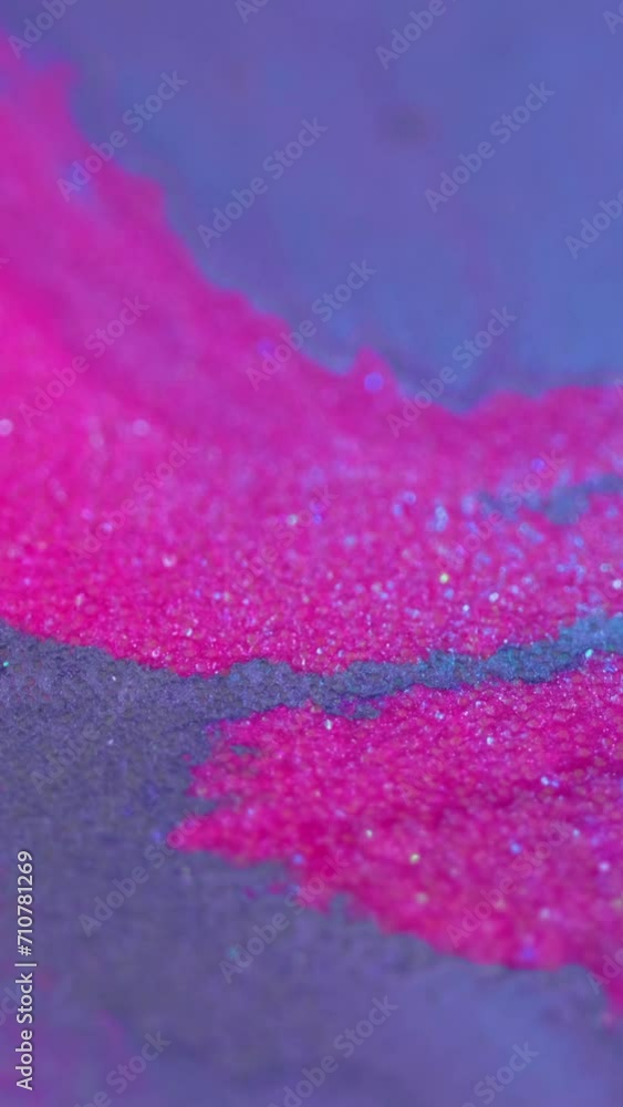 Vertical video. Ink background. Shimmering mix. Aroma bomb. Vibrant glamorous beautiful blue pink purple violet bath relaxation spa salt crystals blend flow. Vertical video. Ink background. Shimmering mix. Aroma bomb. Vibrant glamorous beautiful blue pink purple violet bath relaxation spa salt crystals blend flow.