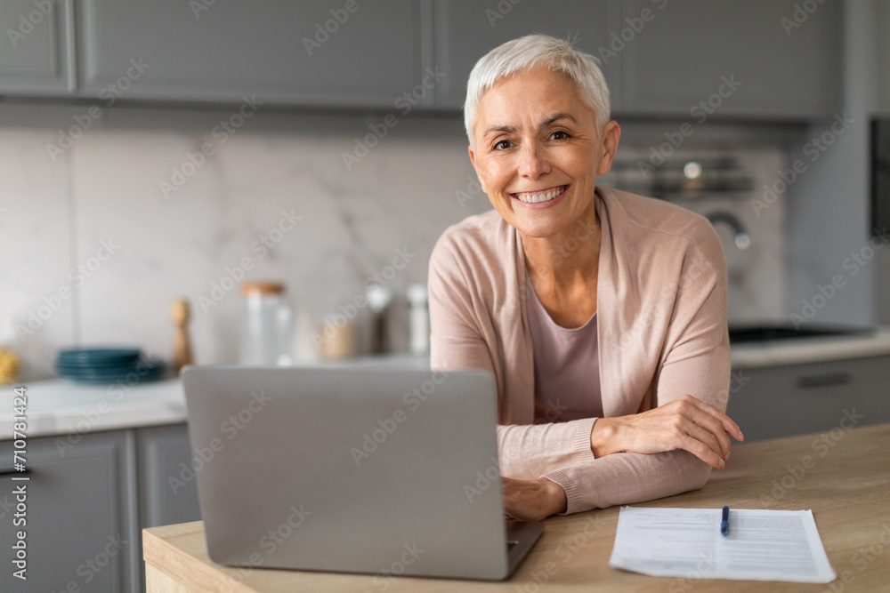 Senior Lady Using Laptop Working Online Engaging In Gadgets Indoor Senior Lady Using Laptop Working Online Engaging In Gadgets Indoor