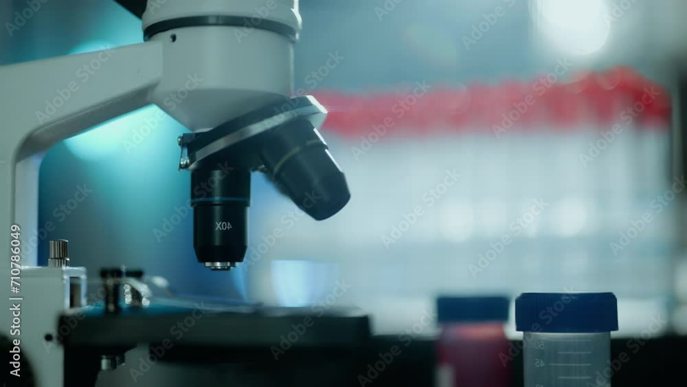 Close up of a optical scientific microscope in laboratory. Science research technology and experiments. Concept of clinical lab and medical equipment. Close up of a optical scientific microscope in laboratory. Science research technology and experiments. Concept of clinical lab and medical equipment.