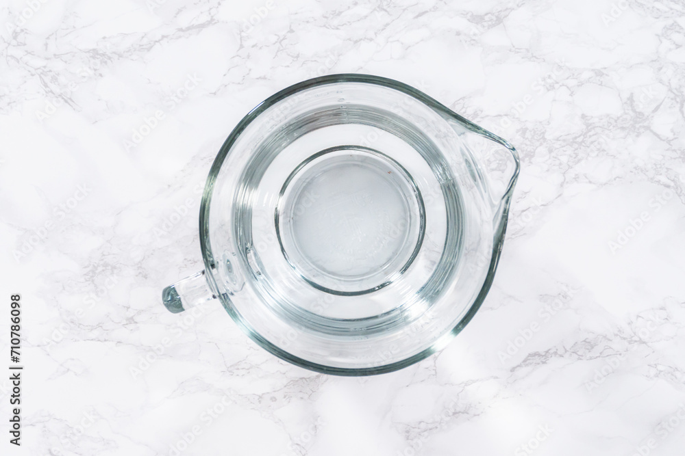 Measuring Glass Cups Filled with Water for Preparation Measuring Glass Cups Filled with Water for Preparation