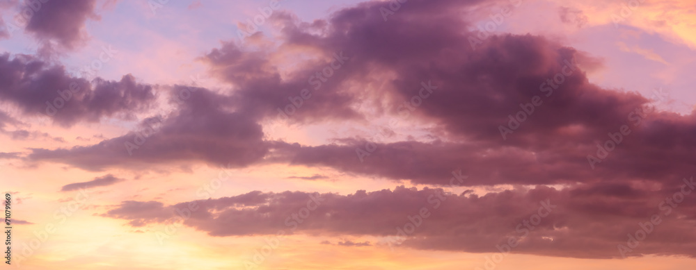  Panoramic view of sunset golden and blue sky nature background.
Colorful dramatic sky with cloud at sunset.Sky background.Sky with clouds at sunset.