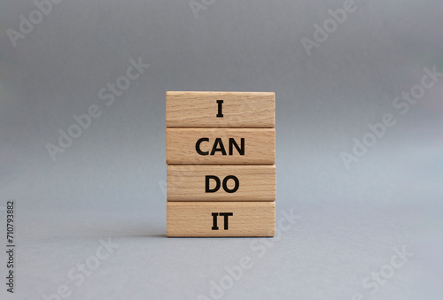 I can do it symbol. Concept words I can do it on wooden blocks. Beautiful grey background. Business and I can do it concept. Copy space.