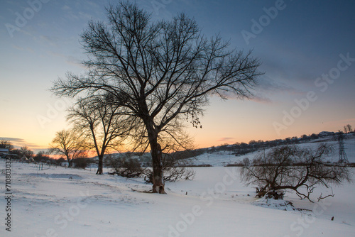 Frosty winter in Russia. Beautiful sunrise in Siberia. Cold winter photo. 