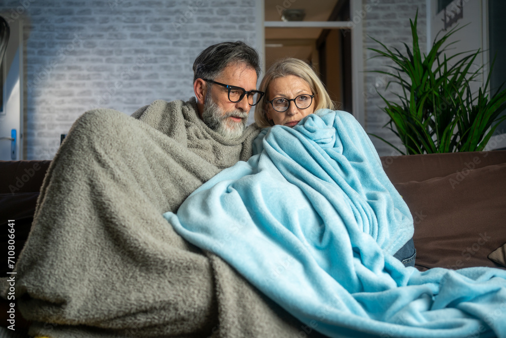 Couple suffering cold at home and problem with house heating